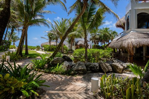 The gardens and grounds at Hacienda del Secreto, including The Butterfly Landing wellness pavilion
