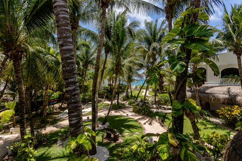 The gardens and grounds at Hacienda del Secreto, including The Butterfly Landing wellness pavilion