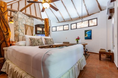 The Honeymoon and Family palapa suites at Hacienda del Secreto, above Palapa Papa Jack