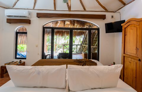 The Honeymoon and Family palapa suites at Hacienda del Secreto, above Palapa Papa Jack