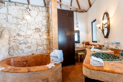 The Honeymoon and Family palapa suites at Hacienda del Secreto, above Palapa Papa Jack