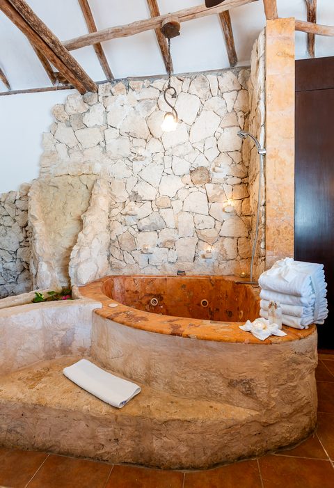 The Honeymoon and Family palapa suites at Hacienda del Secreto, above Palapa Papa Jack