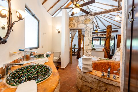 The Honeymoon and Family palapa suites at Hacienda del Secreto, above Palapa Papa Jack