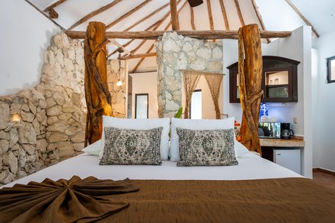 The Honeymoon and Family palapa suites at Hacienda del Secreto, above Palapa Papa Jack