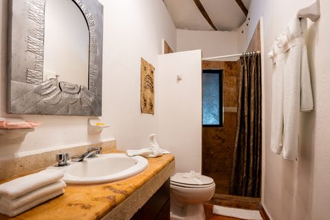 The Honeymoon and Family palapa suites at Hacienda del Secreto, above Palapa Papa Jack