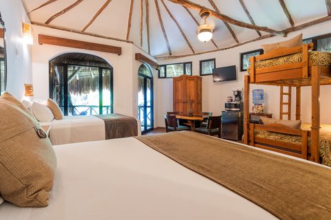 The Honeymoon and Family palapa suites at Hacienda del Secreto, above Palapa Papa Jack