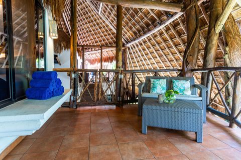 The Honeymoon and Family palapa suites at Hacienda del Secreto, above Palapa Papa Jack