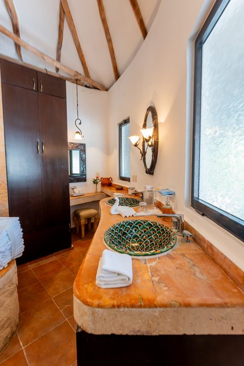 The Honeymoon and Family palapa suites at Hacienda del Secreto, above Palapa Papa Jack