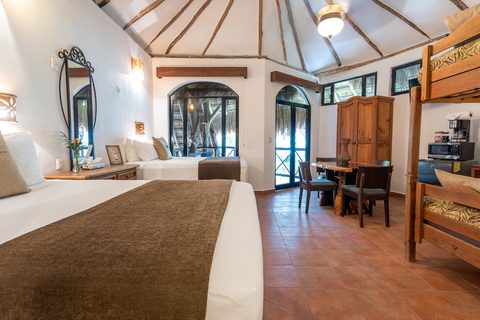 The Honeymoon and Family palapa suites at Hacienda del Secreto, above Palapa Papa Jack