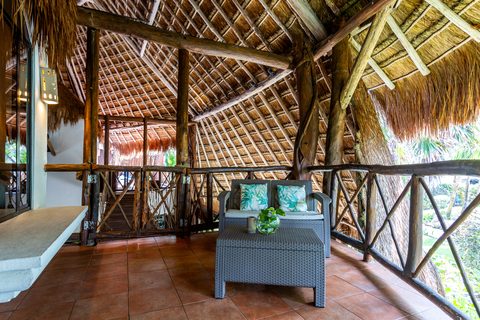 The Honeymoon and Family palapa suites at Hacienda del Secreto, above Palapa Papa Jack