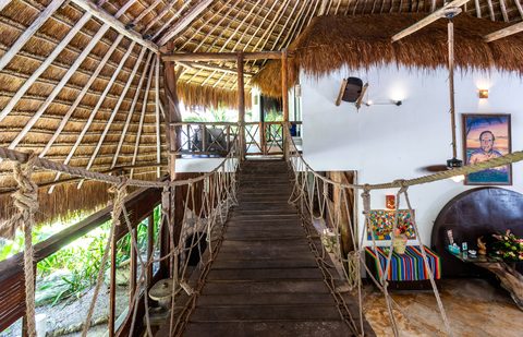 The Honeymoon and Family palapa suites at Hacienda del Secreto, above Palapa Papa Jack