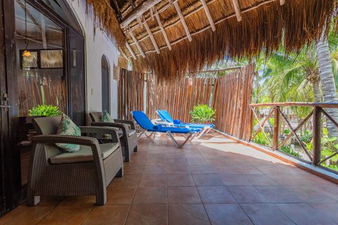 The Honeymoon and Family palapa suites at Hacienda del Secreto, above Palapa Papa Jack