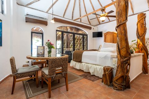 The Honeymoon and Family palapa suites at Hacienda del Secreto, above Palapa Papa Jack
