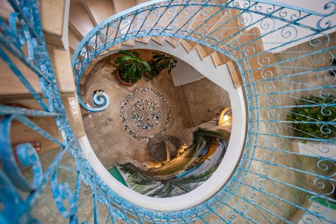 Villa Sarita at Hacienda del Secreto, a turquoise-and-gold beachfront villa on Playa del Secreto