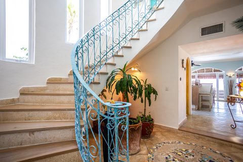Villa Sarita at Hacienda del Secreto, a turquoise-and-gold beachfront villa on Playa del Secreto