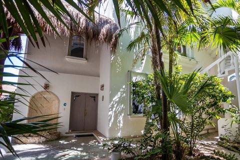 Villa Sarita at Hacienda del Secreto, a turquoise-and-gold beachfront villa on Playa del Secreto