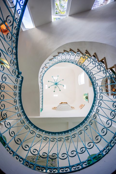 Villa Sarita at Hacienda del Secreto, a turquoise-and-gold beachfront villa on Playa del Secreto