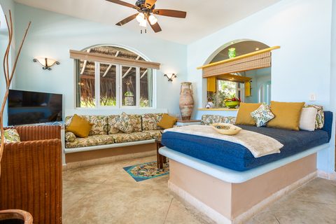 Villa Sarita at Hacienda del Secreto, a turquoise-and-gold beachfront villa on Playa del Secreto