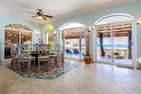 Villa Sarita at Hacienda del Secreto, a turquoise-and-gold beachfront villa on Playa del Secreto