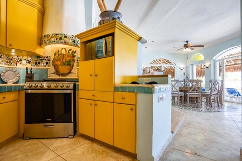 Villa Sarita at Hacienda del Secreto, a turquoise-and-gold beachfront villa on Playa del Secreto