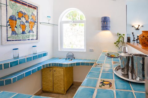 Villa Sarita at Hacienda del Secreto, a turquoise-and-gold beachfront villa on Playa del Secreto