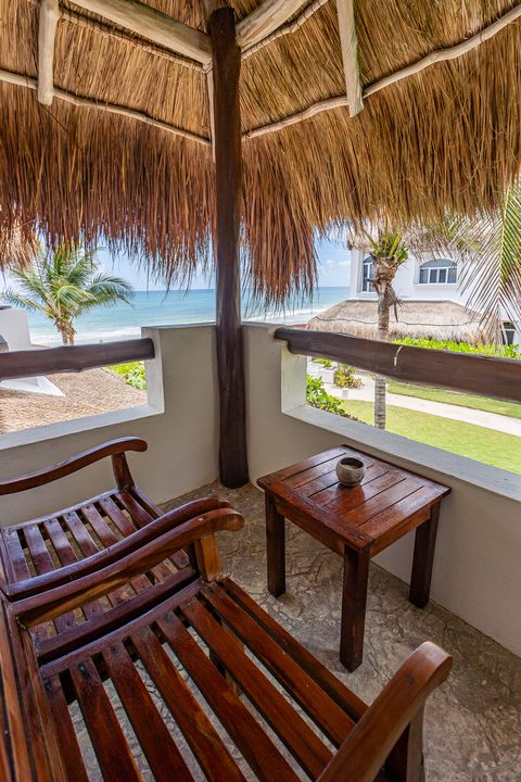 Villa Sarita at Hacienda del Secreto, a turquoise-and-gold beachfront villa on Playa del Secreto
