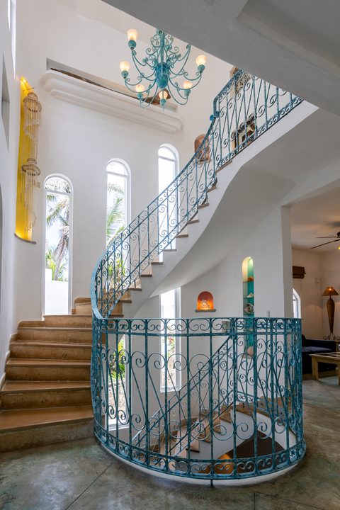 Villa Sarita at Hacienda del Secreto, a turquoise-and-gold beachfront villa on Playa del Secreto