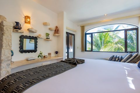 Villa Umakiha at Hacienda del Secreto, a Mayan-inspired limestone villa on Playa del Secreto